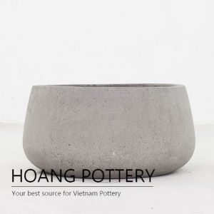 Raw cement low palm planter