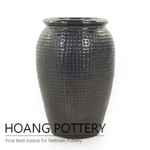 Brown ceramic vase planter for garden