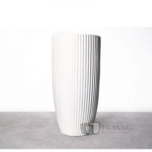 Black round cylinder fiberglass pot