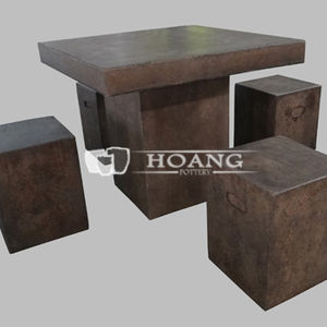 Brown cement tables and chairs