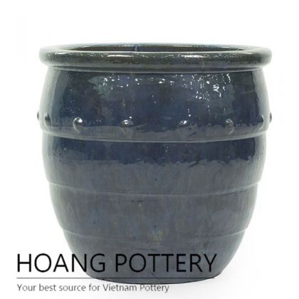 Moss green round ceramic step planter