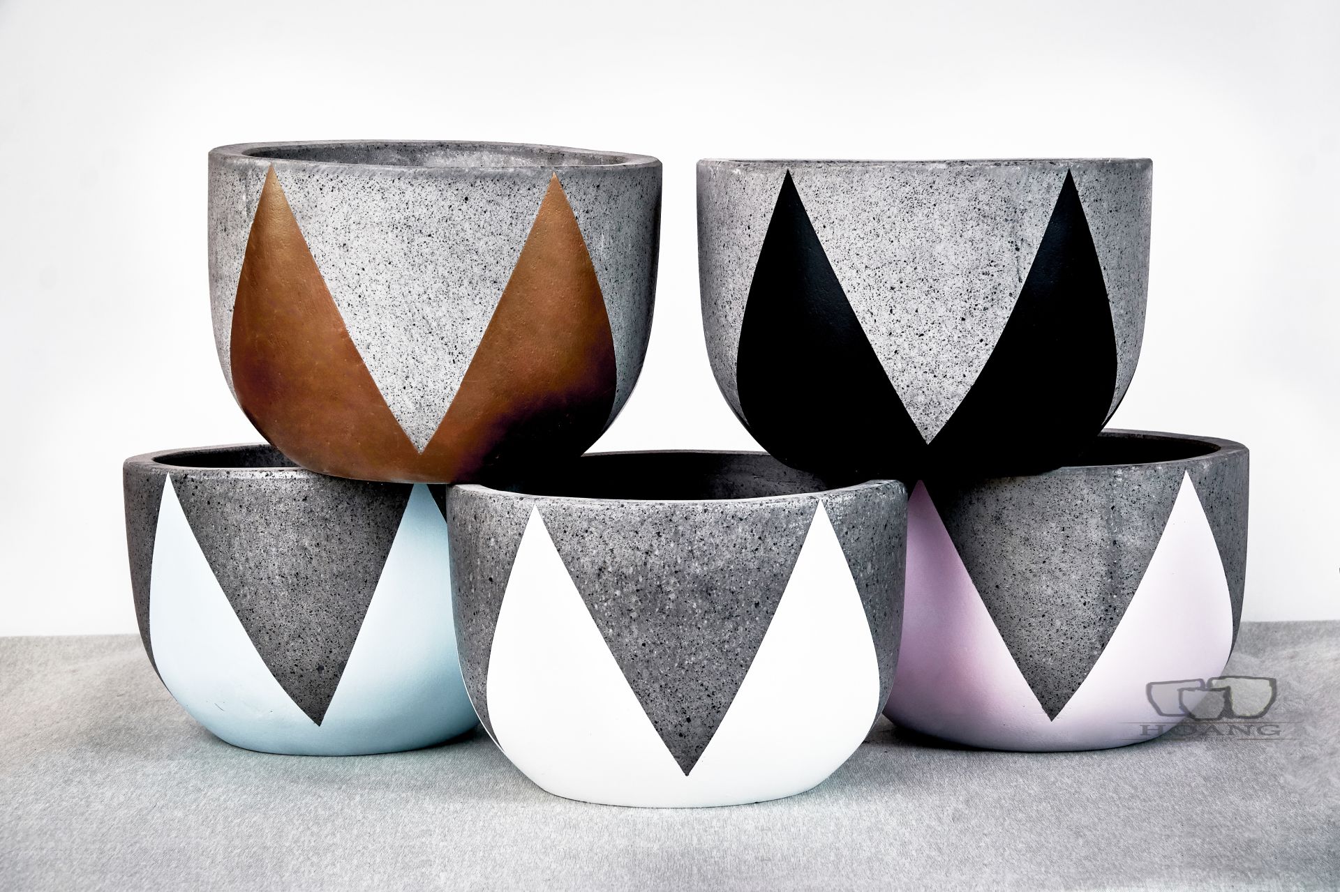 Cement pots are having a moment in interior and exterior design.